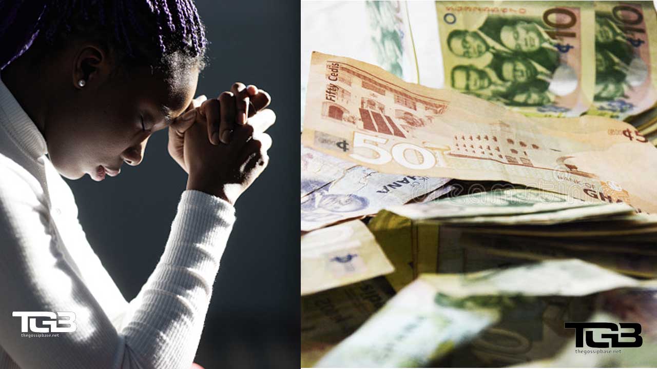 Black woman praying with money