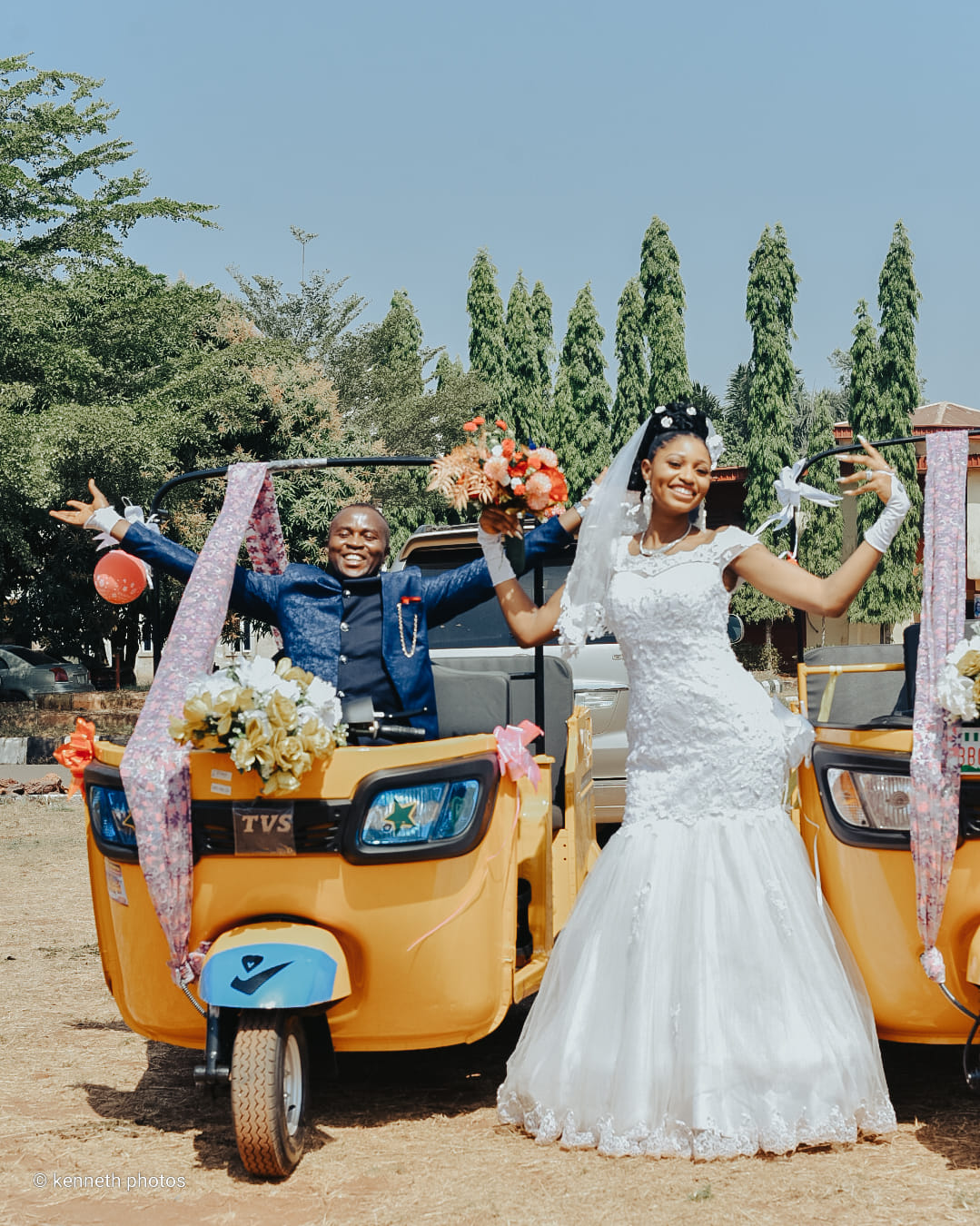 Couple cruising in a tricycle on their wedding day